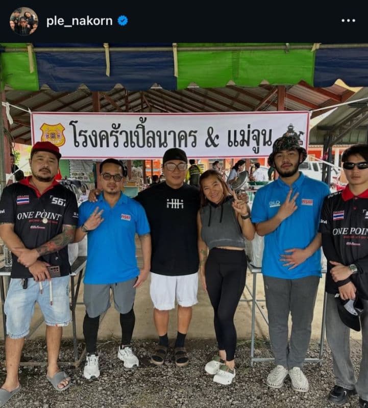 Flood victims receiving meals from relief team