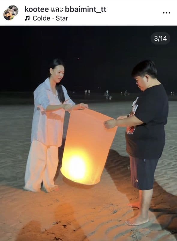 Kootee Aramboy与Nong Baimint海边浪漫互动的照片