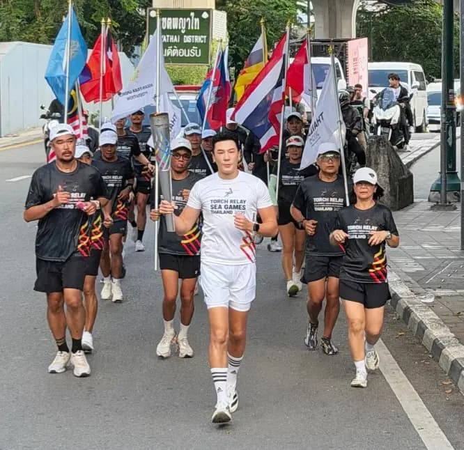 Dom Prakorn参与圣火传递活动照片